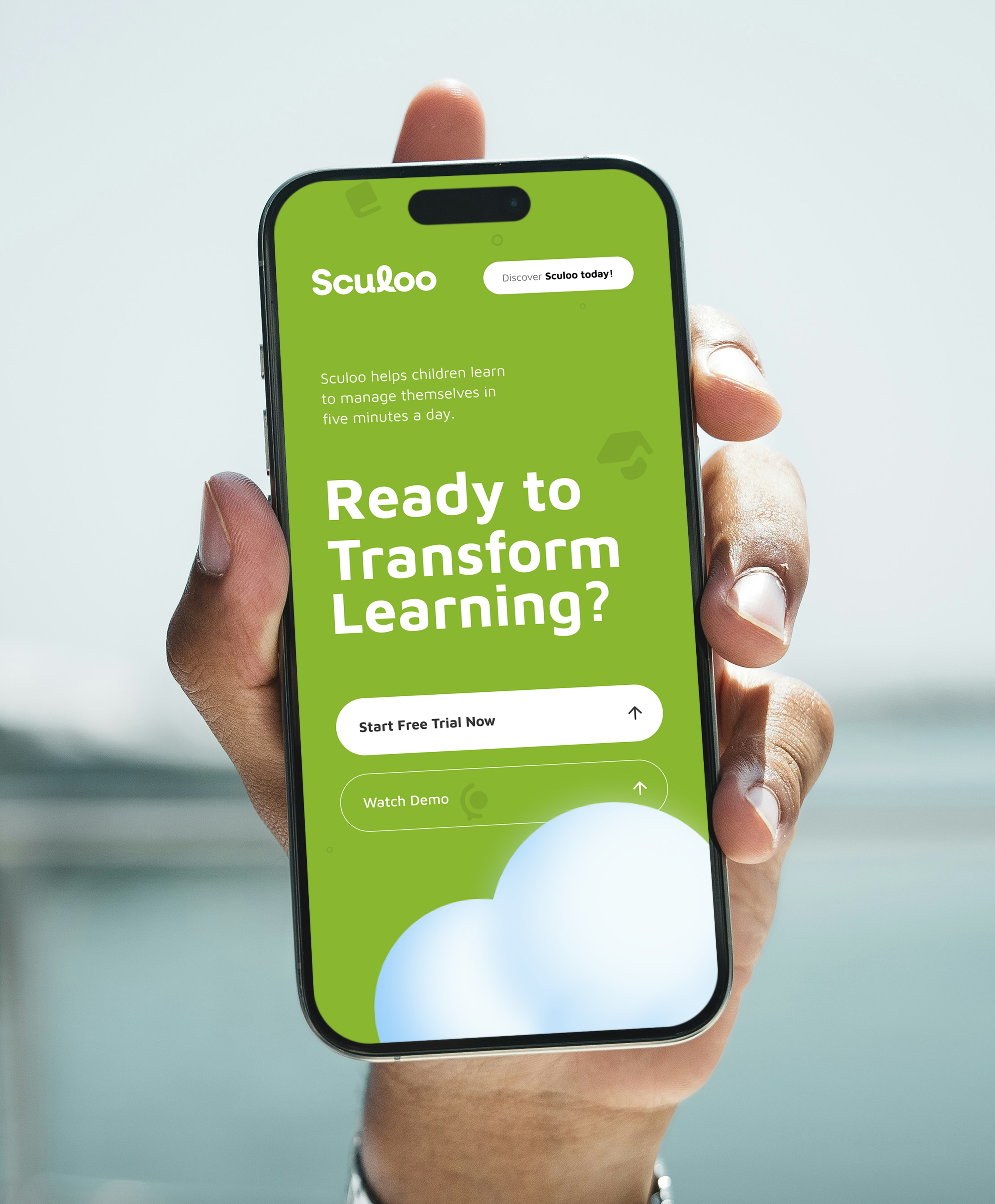 A hand holding up a phone against a hazy sea, showing the green Sculoo site: “Ready to Transform Learning?” with Start Free Trial Now and Watch Demo buttons above a soft cloud