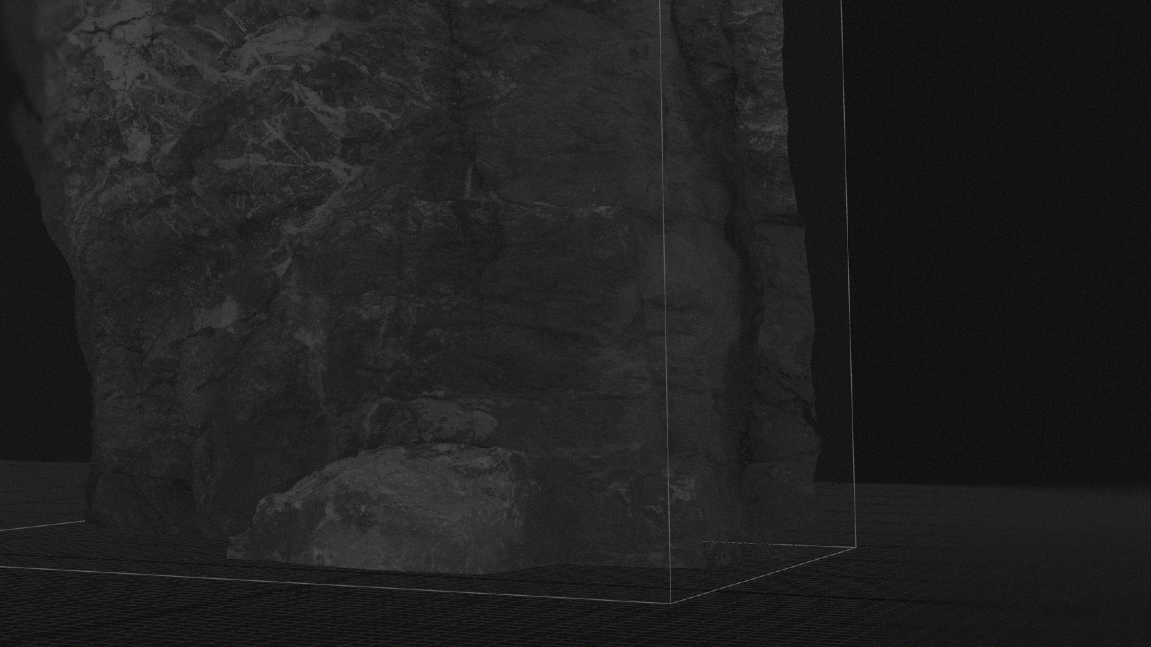 A wireframe render of a rock