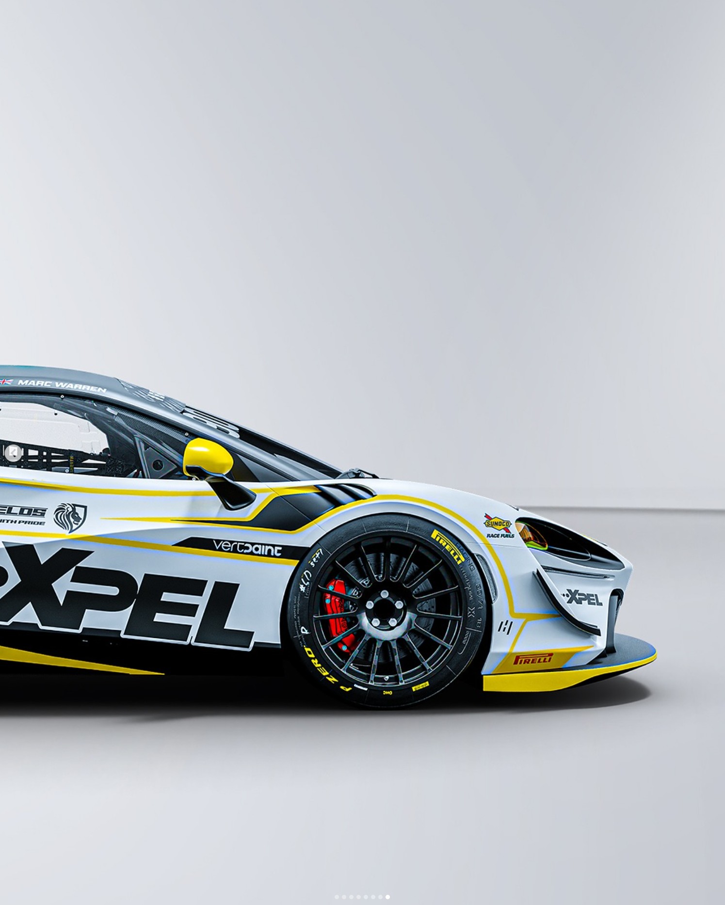 The front half of the McLaren, with the Vertpaint wordmark on the door above the XPEL lettering