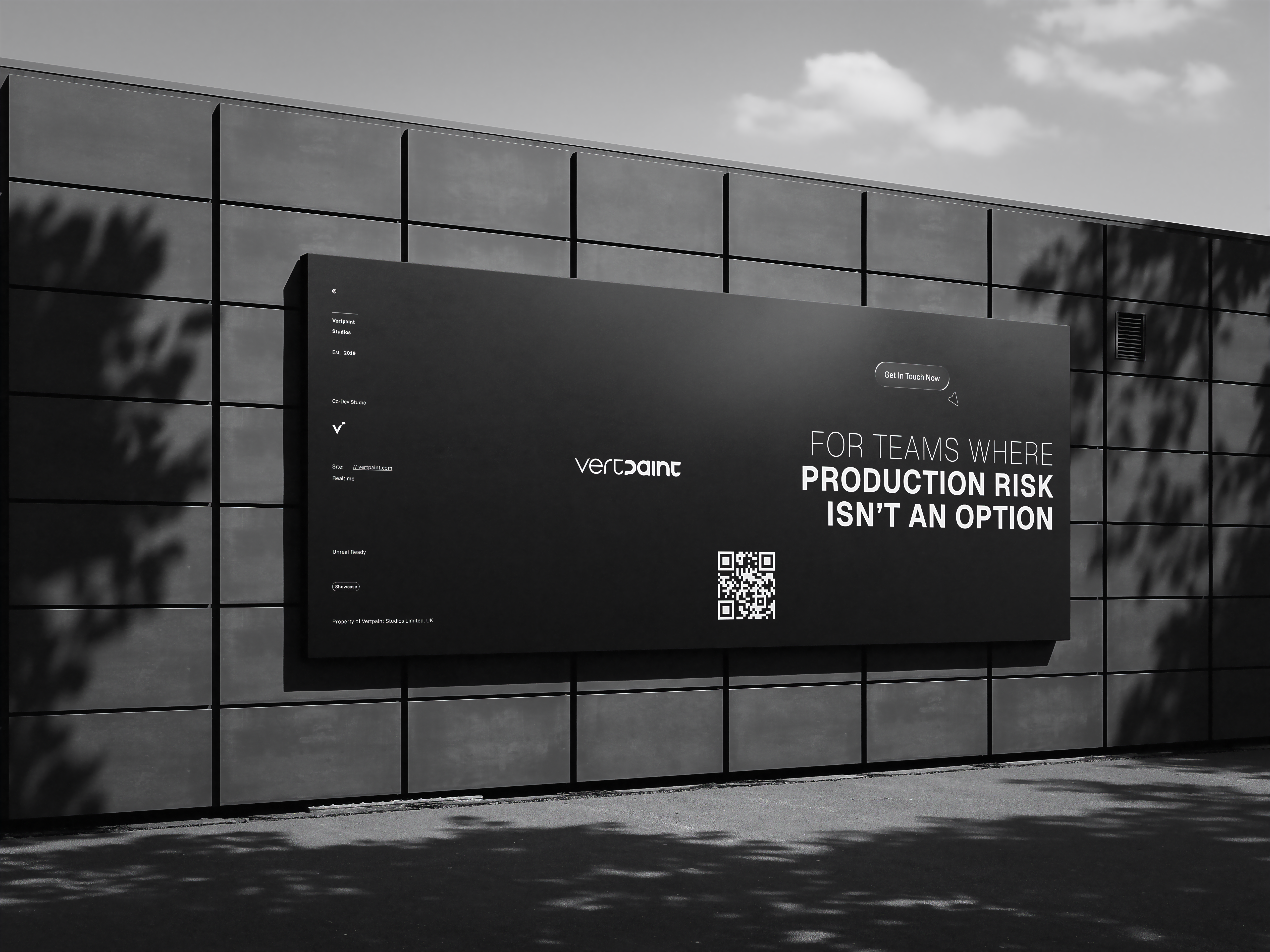 A billboard advert with the Vertpaint wordmark and the line “For teams where production risk isn’t an option”